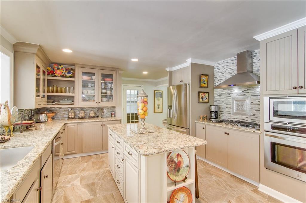 205 Shadow Valley Road High Point, NC 27262 - Photo 4 of 30 Kitchen Island and gorgeous granite!