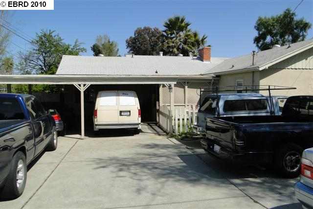 998 Oak Grove Road Concord, CA 94518 - Photo 1 of 1 a front view of a house with a garage