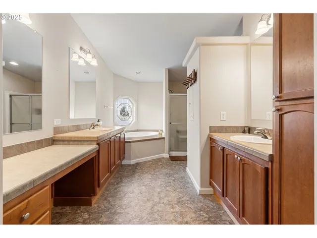a kitchen with a sink stove and refrigerator