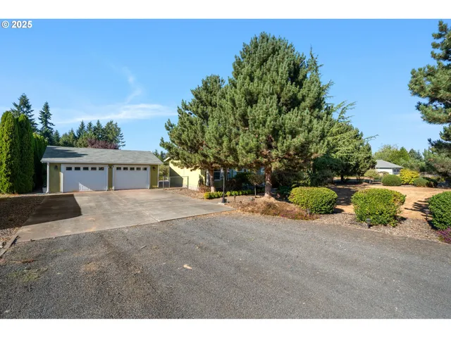 a view of a lake with sitting area