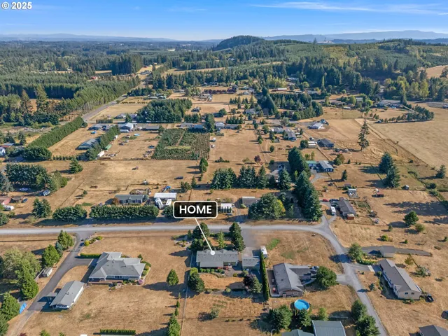 a black and white photo of a bench