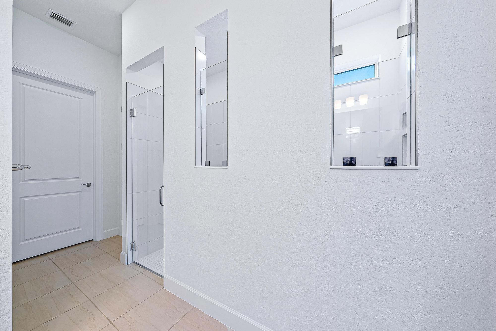 9775 Southwest Meridian Way Stuart, FL 34997 - Photo 23 of 33 Primary Bathroom Suite