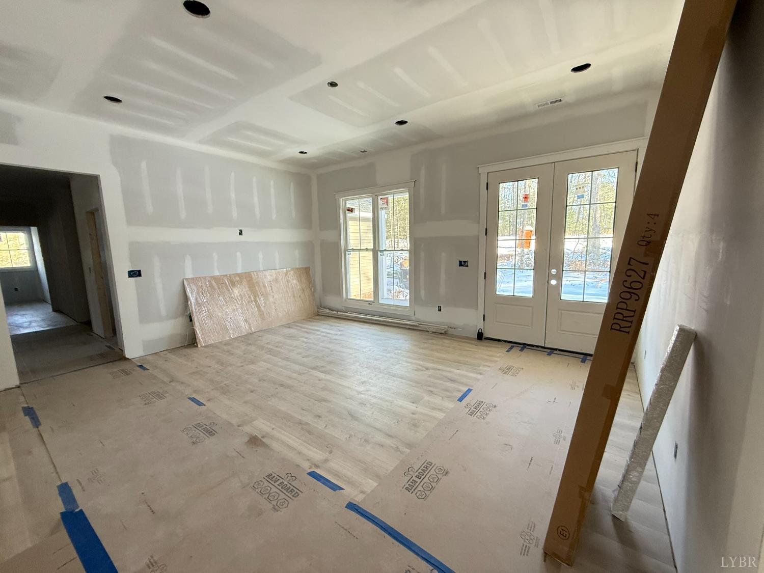116 Blue Sky Court Monroe, VA 24574 - Photo 10 of 44 a spacious bedroom with a large bed and a window