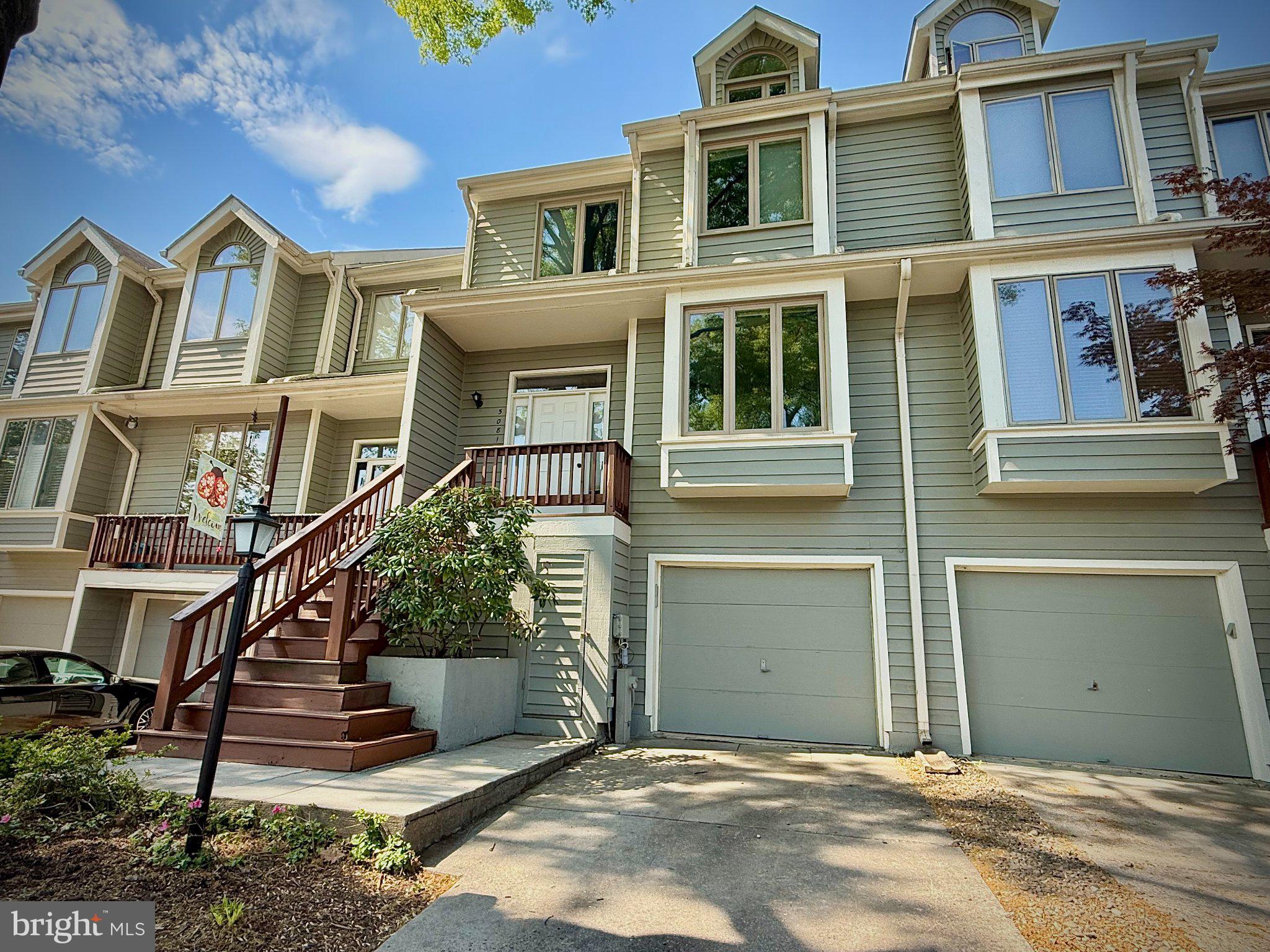 Charming townhouse with inviting entry.