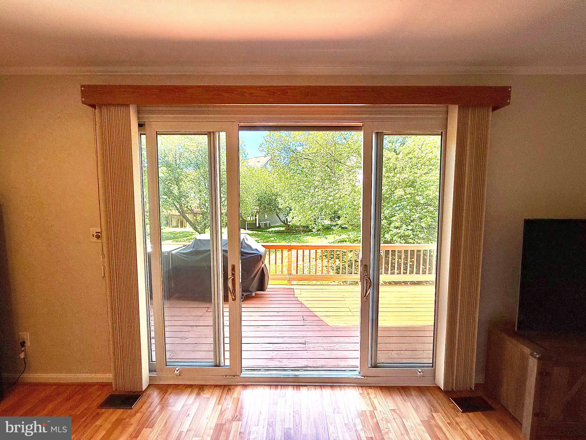 5081 Columbia Road, Unit 17 105 Columbia, MD 21044 - Photo 16 of 40 Bright view through sliding doors.