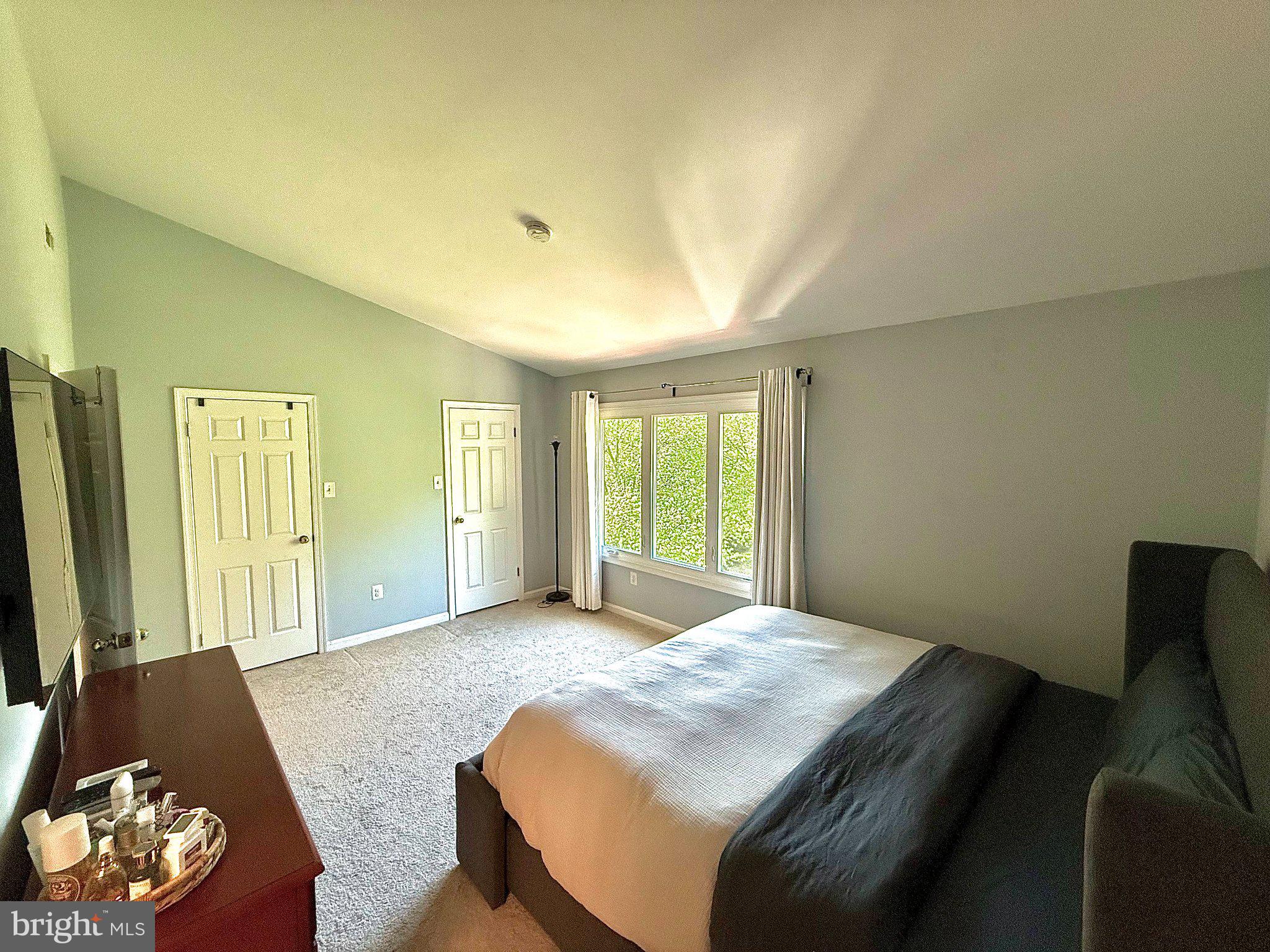 5081 Columbia Road, Unit 17 105 Columbia, MD 21044 - Photo 23 of 40 Serene bedroom with natural light.