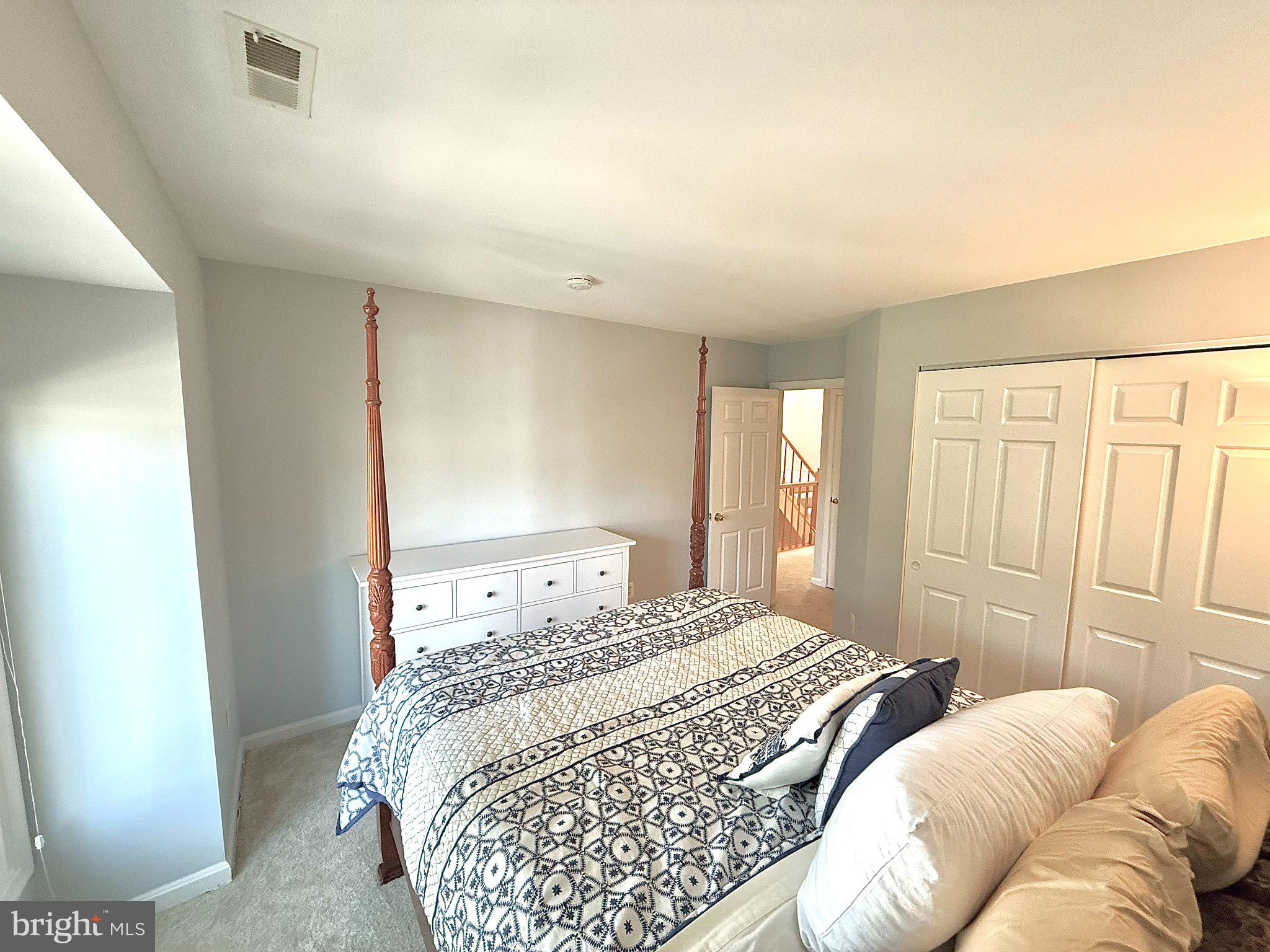 5081 Columbia Road, Unit 17 105 Columbia, MD 21044 - Photo 26 of 40 Serene bedroom with elegant charm.