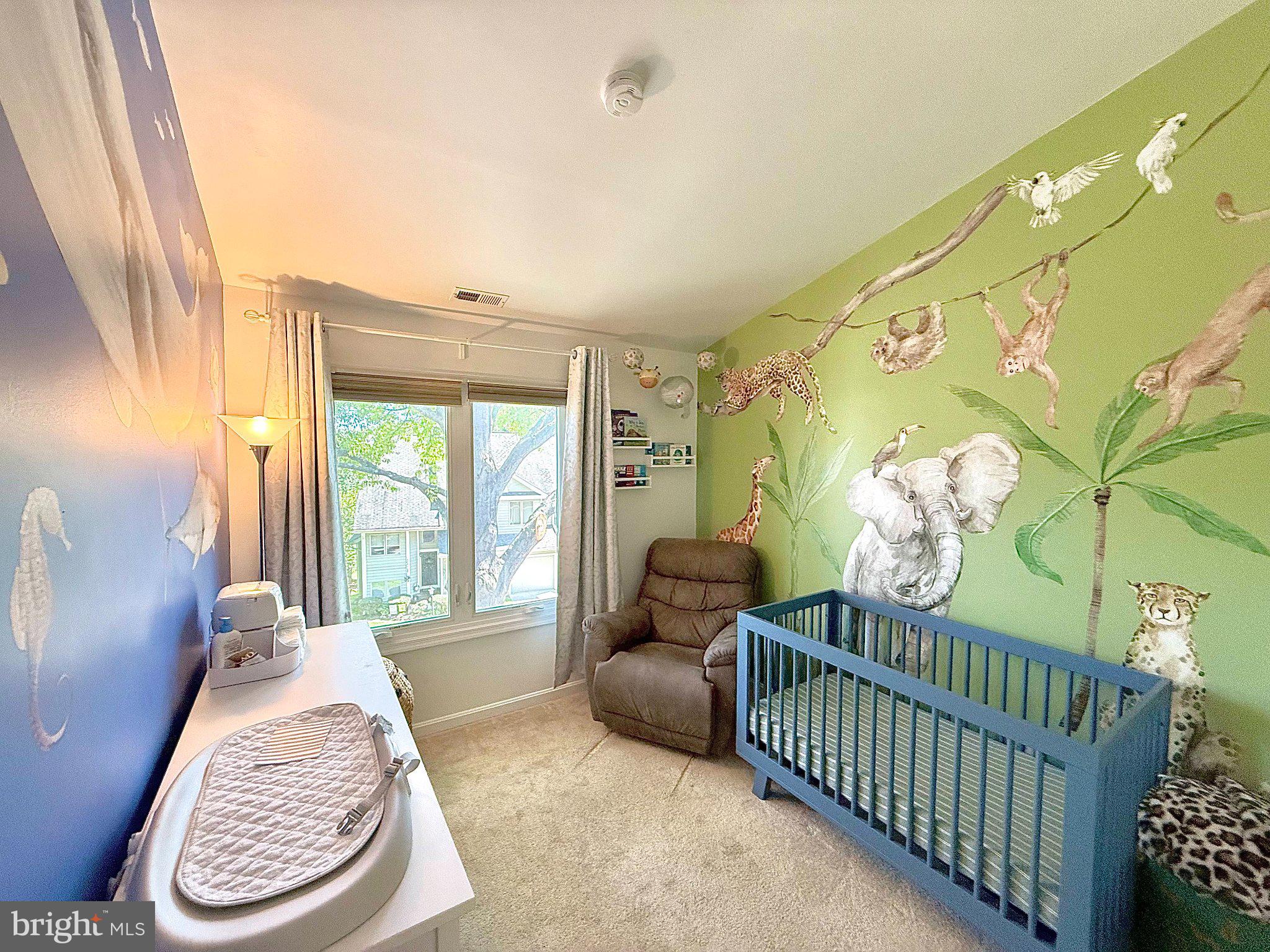 5081 Columbia Road, Unit 17 105 Columbia, MD 21044 - Photo 27 of 40 Whimsical nursery with playful murals.