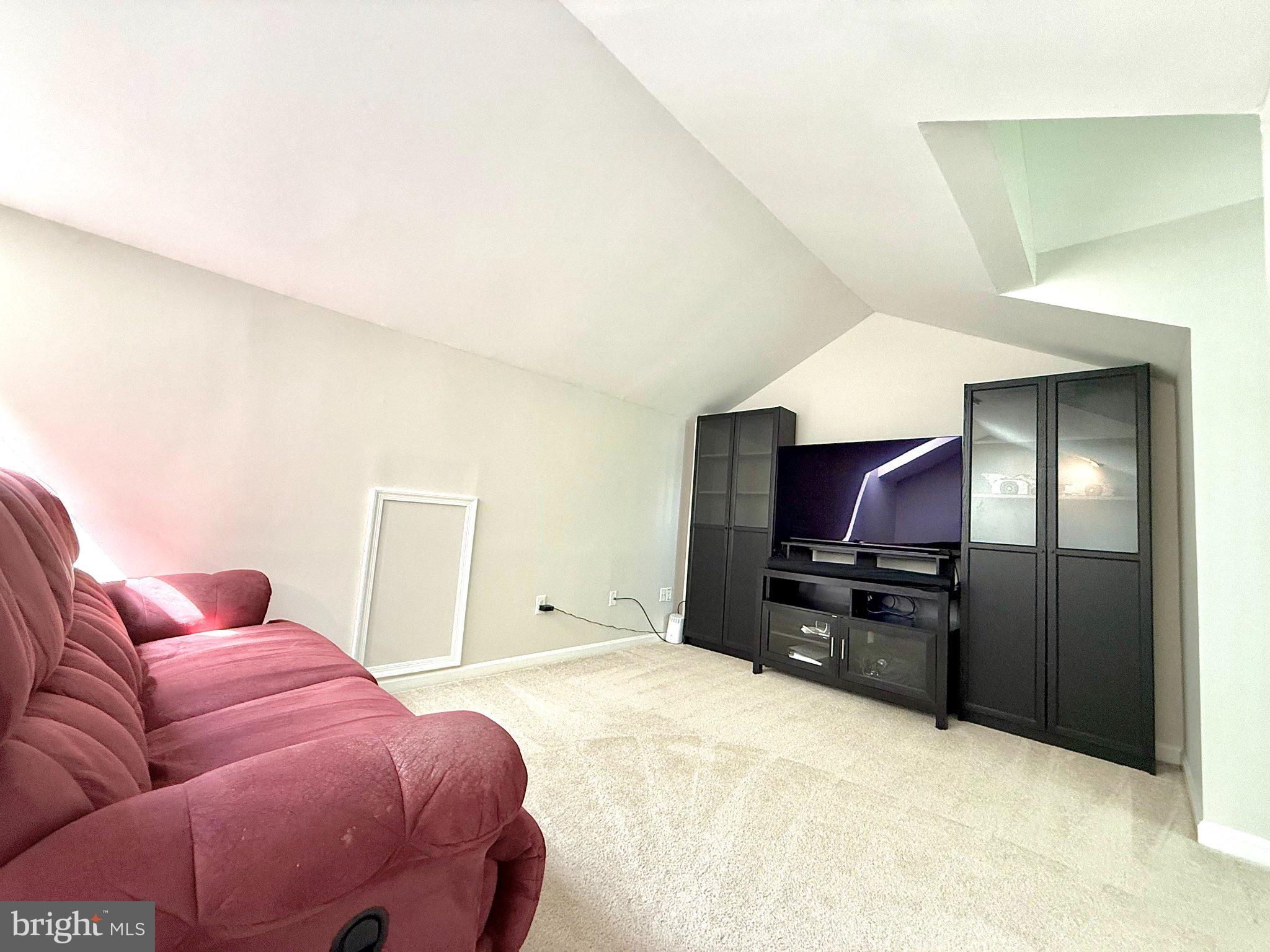 5081 Columbia Road, Unit 17 105 Columbia, MD 21044 - Photo 32 of 40 Cozy attic retreat with modern flair.