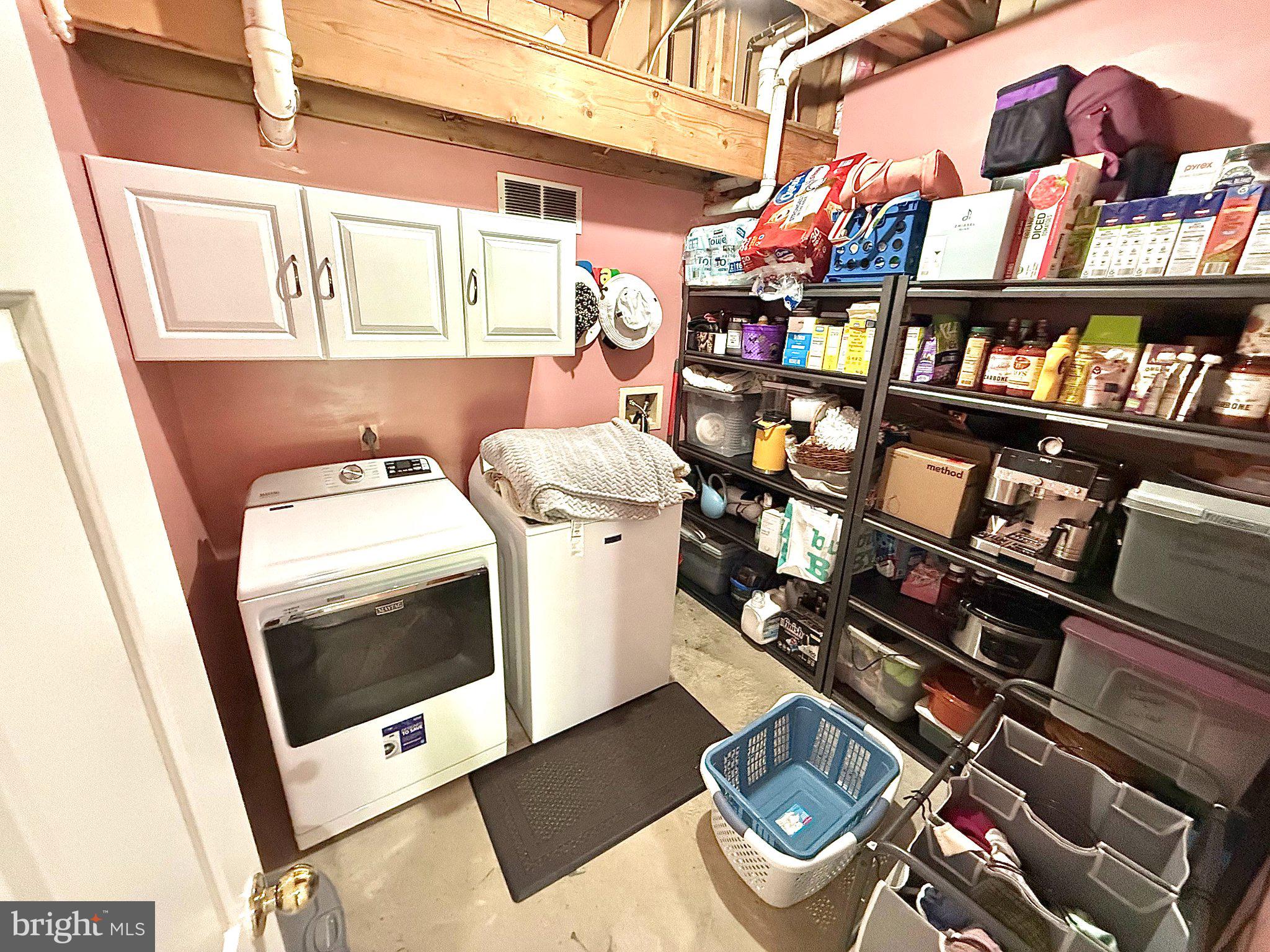 5081 Columbia Road, Unit 17 105 Columbia, MD 21044 - Photo 37 of 40 Functional laundry space with storage.