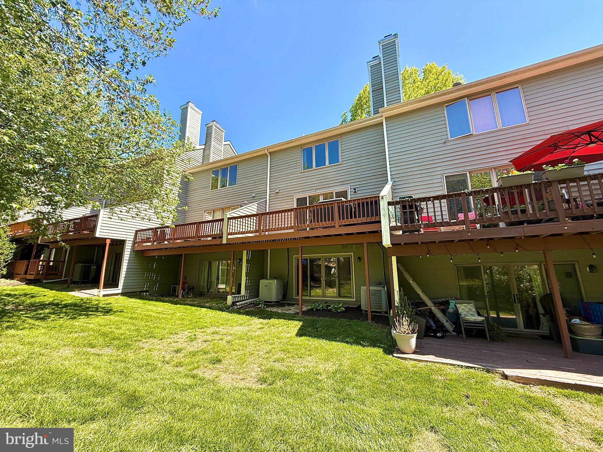 5081 Columbia Road, Unit 17 105 Columbia, MD 21044 - Photo 40 of 40 Charming townhomes with lush greenery.