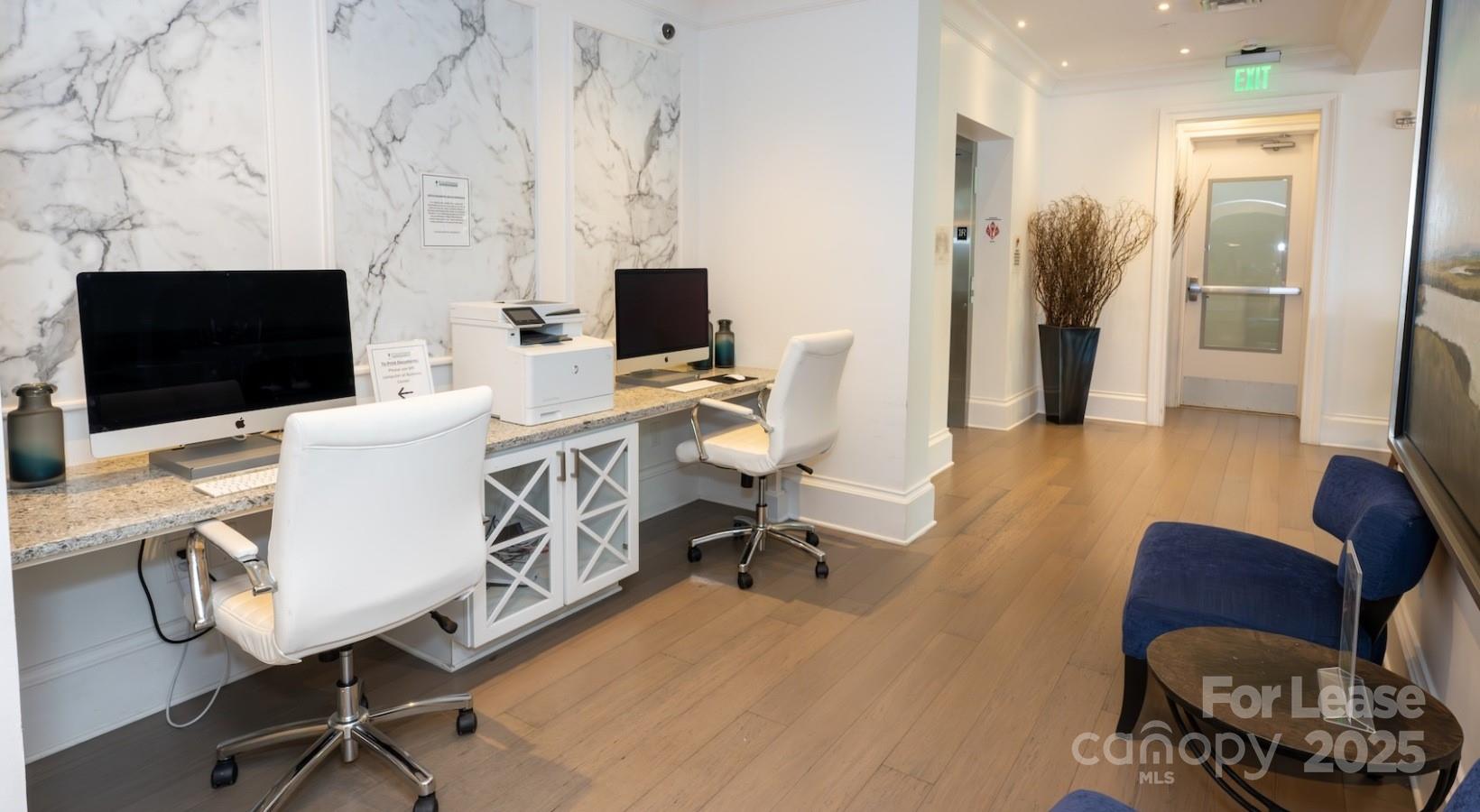 10624 Parrish Street, Unit B1 Matthews, NC 28105 - Photo 14 of 42 a view of a livingroom with workspace and a couch