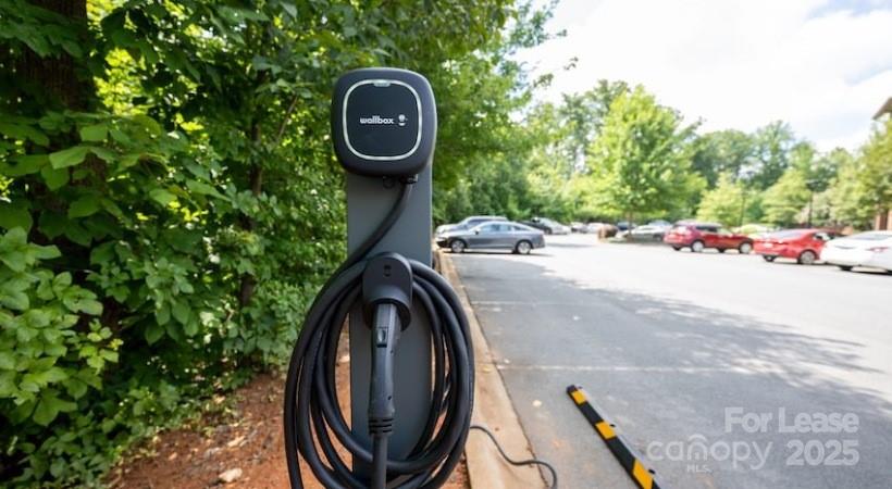 10624 Parrish Street, Unit B1 Matthews, NC 28105 - Photo 15 of 42 an outdoor view with patio area