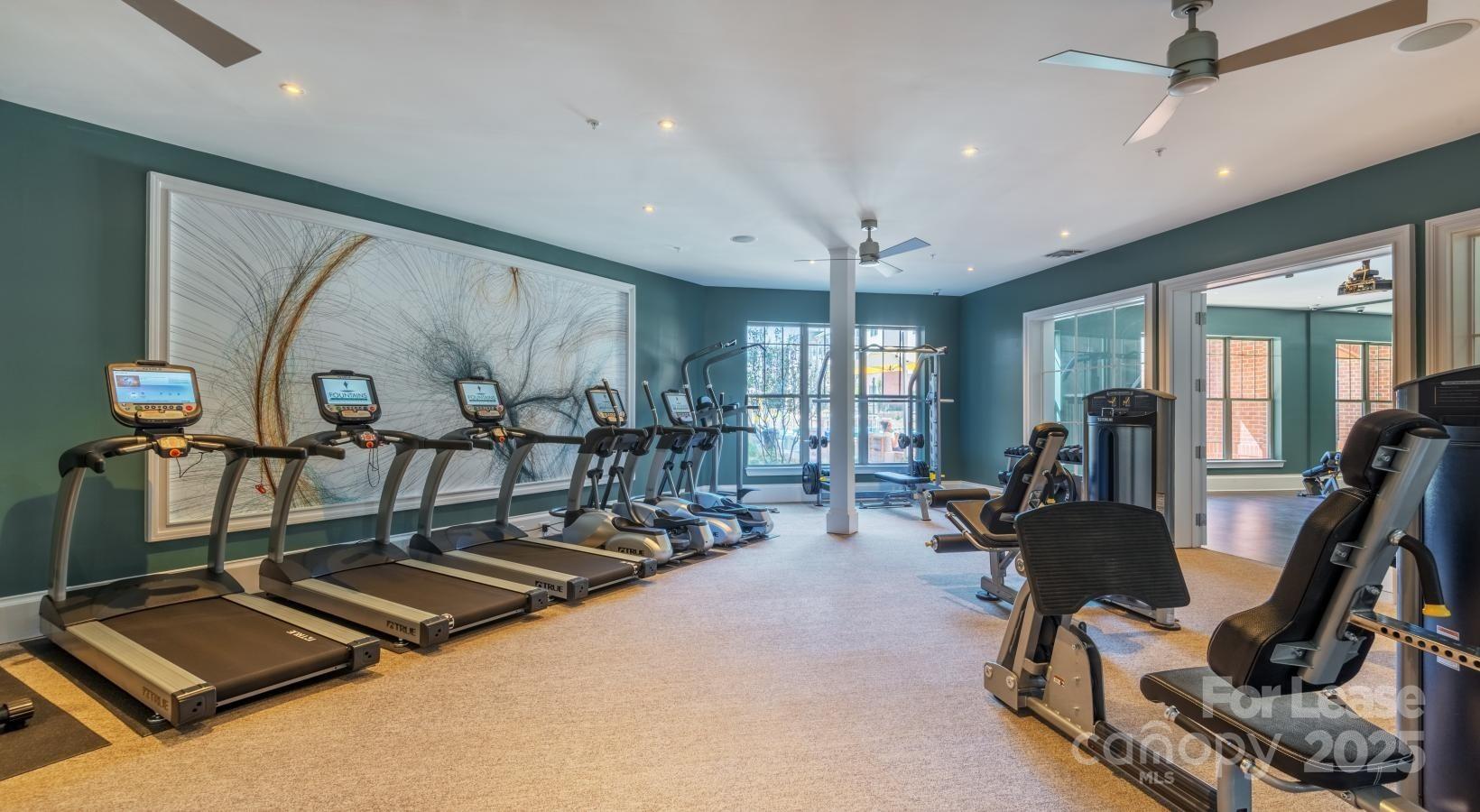 10624 Parrish Street, Unit B1 Matthews, NC 28105 - Photo 20 of 42 a view of a room with gym equipment