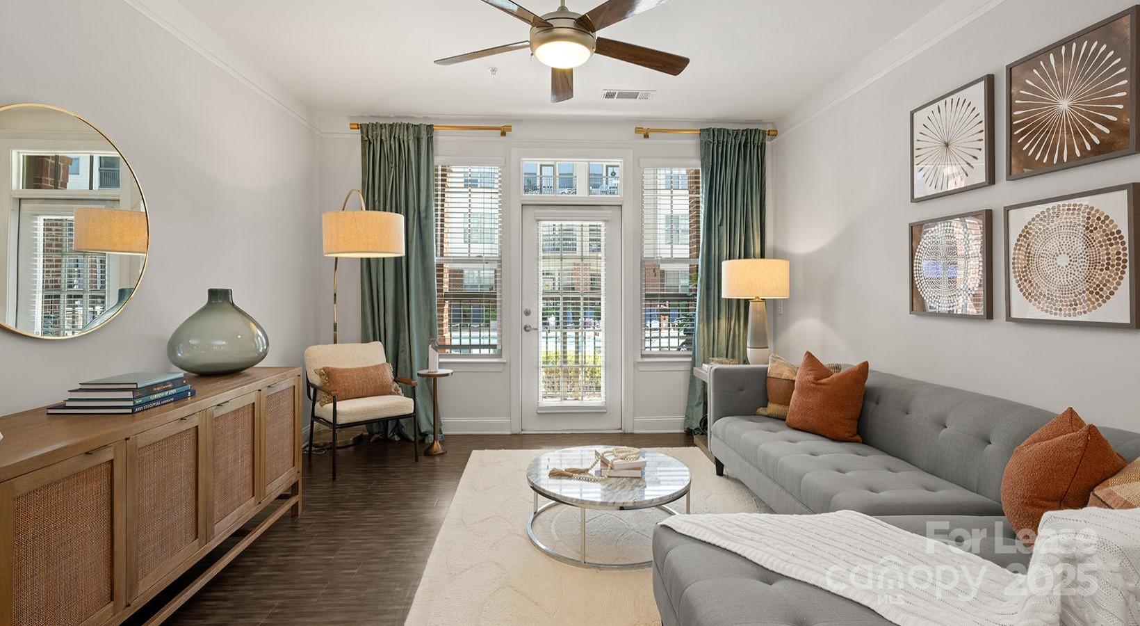10624 Parrish Street, Unit B1 Matthews, NC 28105 - Photo 39 of 42 a living room with furniture and a large window