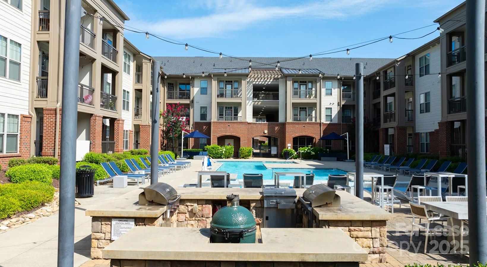 10624 Parrish Street, Unit B1 Matthews, NC 28105 - Photo 42 of 42 a view of pool with outdoor seating