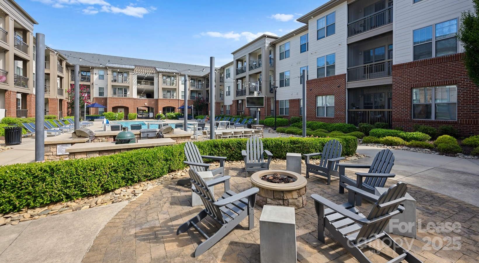 10624 Parrish Street, Unit B1 Matthews, NC 28105 - Photo 7 of 42 a view of a patio with chairs and plants