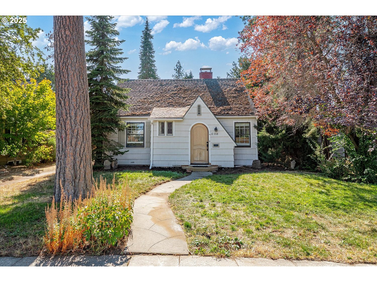 1118 East 28th Avenue Spokane, WA 99203 - Photo 2 of 48 a view of a house with a yard