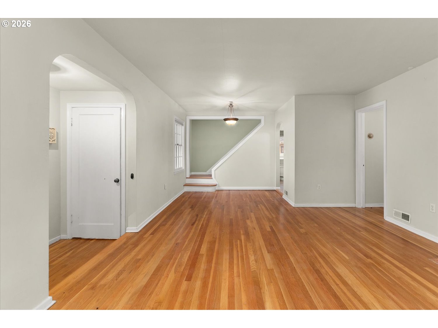 1118 East 28th Avenue Spokane, WA 99203 - Photo 35 of 48 a view of a room with wooden floor and staircase