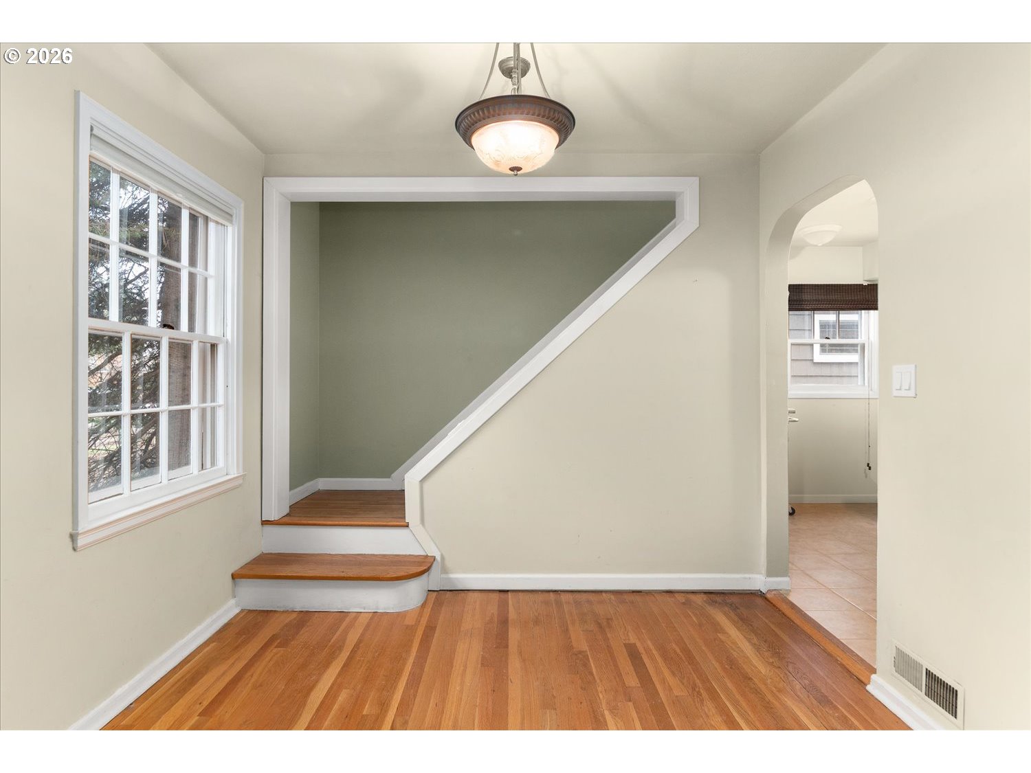 1118 East 28th Avenue Spokane, WA 99203 - Photo 41 of 48 a view of an entryway with wooden floor and a cabinet