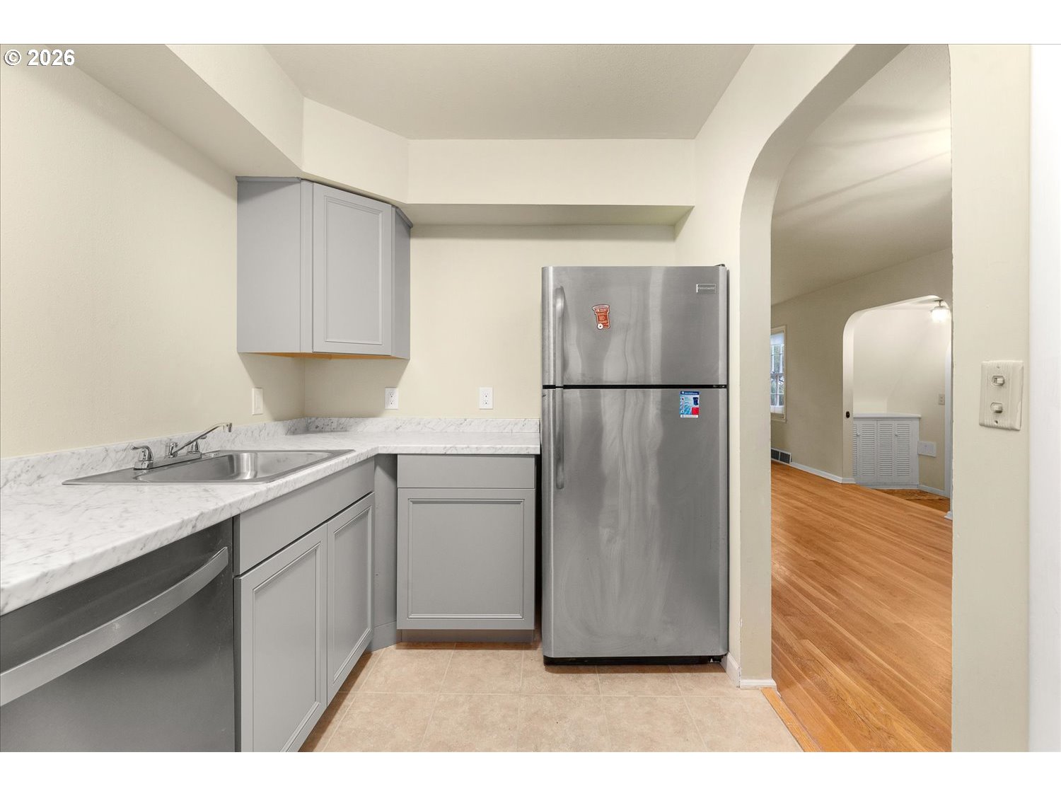 1118 East 28th Avenue Spokane, WA 99203 - Photo 43 of 48 a kitchen with a refrigerator and a sink