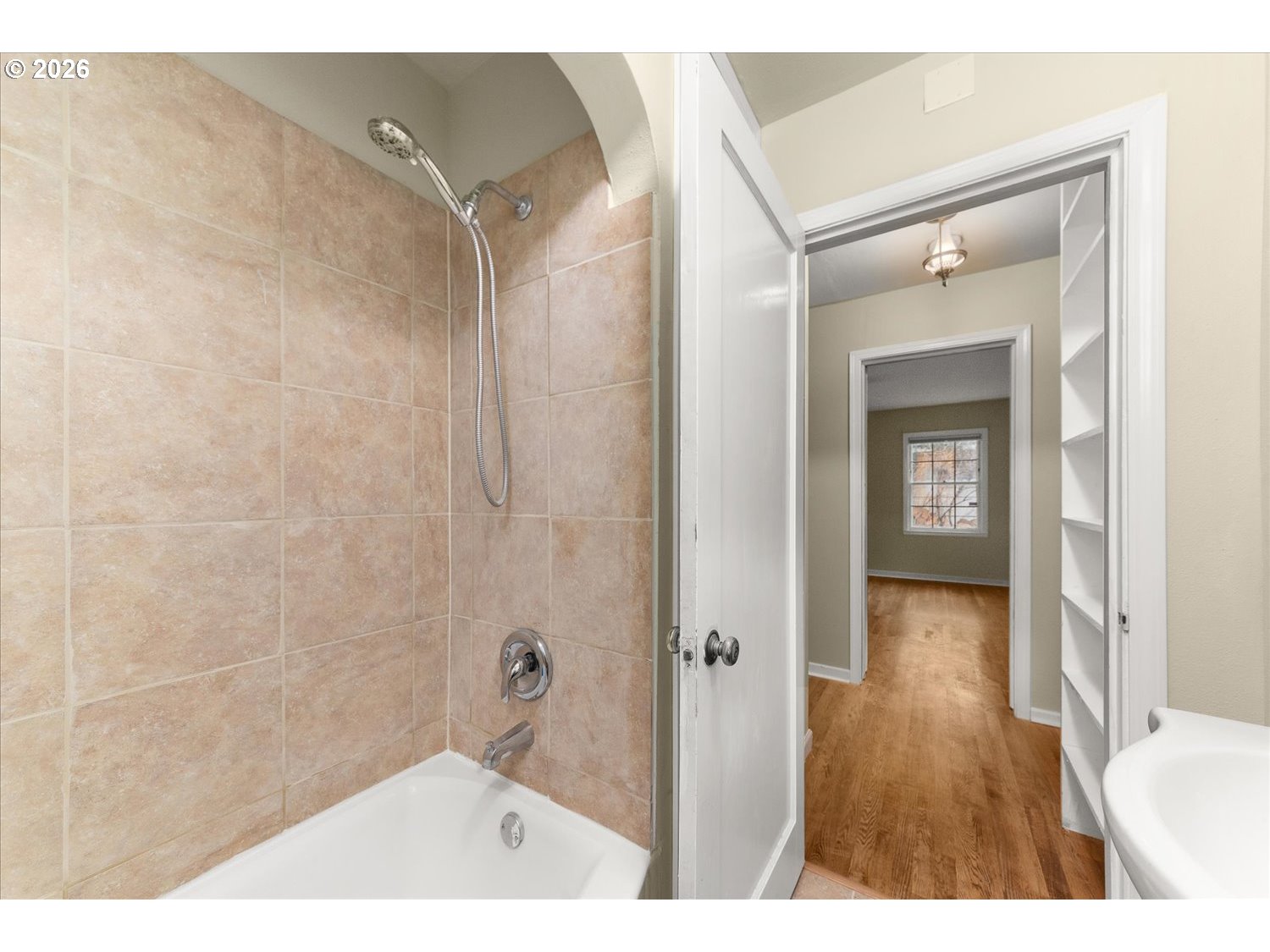 1118 East 28th Avenue Spokane, WA 99203 - Photo 48 of 48 a bathroom with a shower and a sink