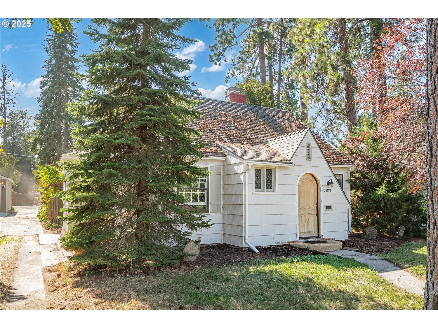 1118 East 28th Avenue Spokane, WA 99203 - Photo 6 of 48 a view of a house with a yard