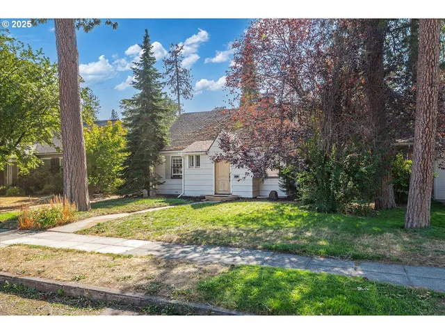 a house view with a backyard space