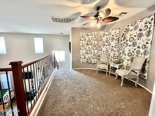wooden floor in a hall with a window
