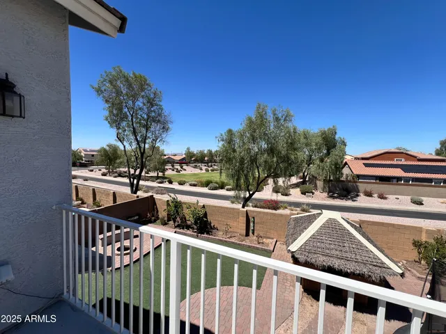 a view of a deck with furniture