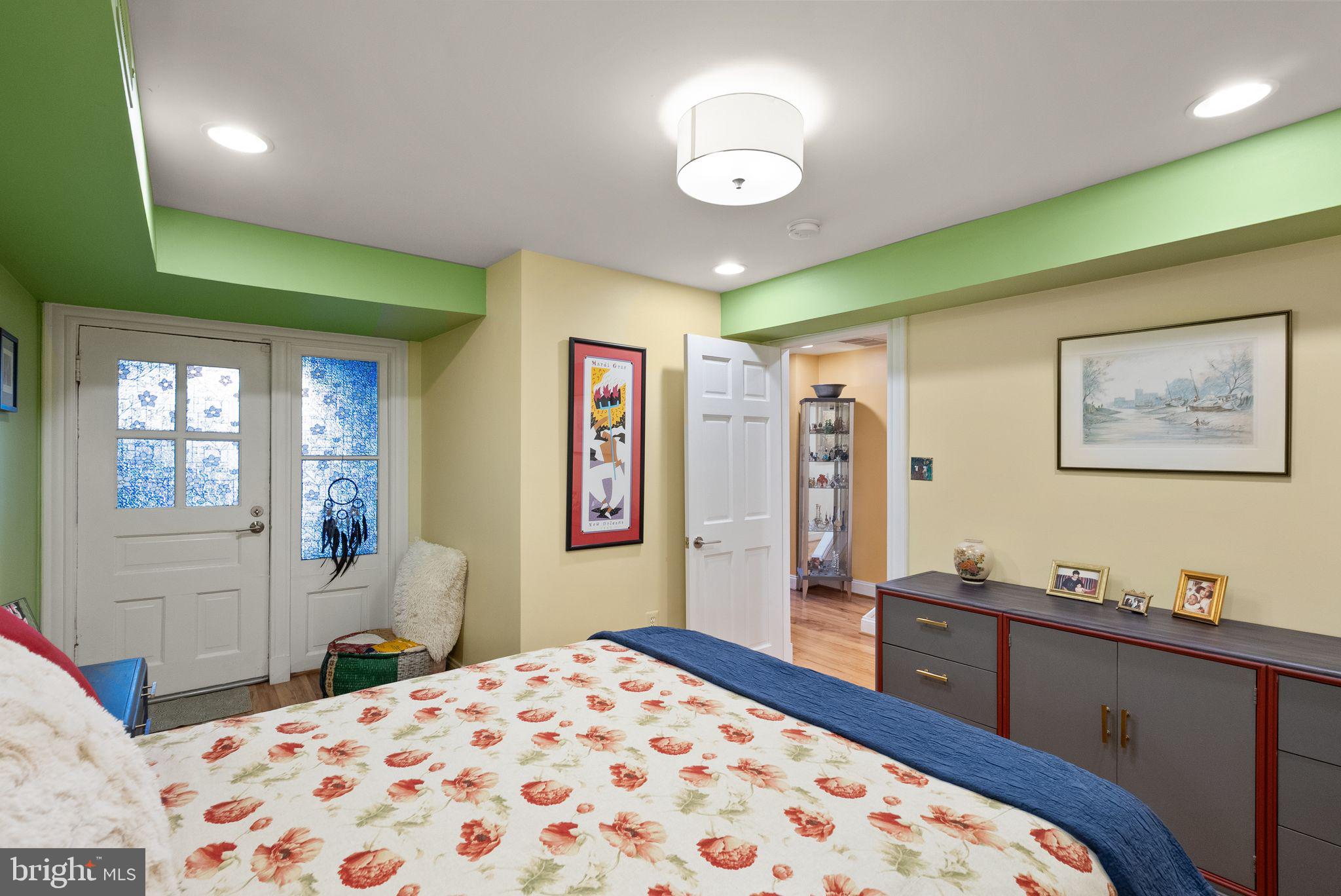 1335 Harvard Street Northwest, Unit 1 Washington, DC 20009 - Photo 14 of 29 Charming bedroom with vibrant accents.