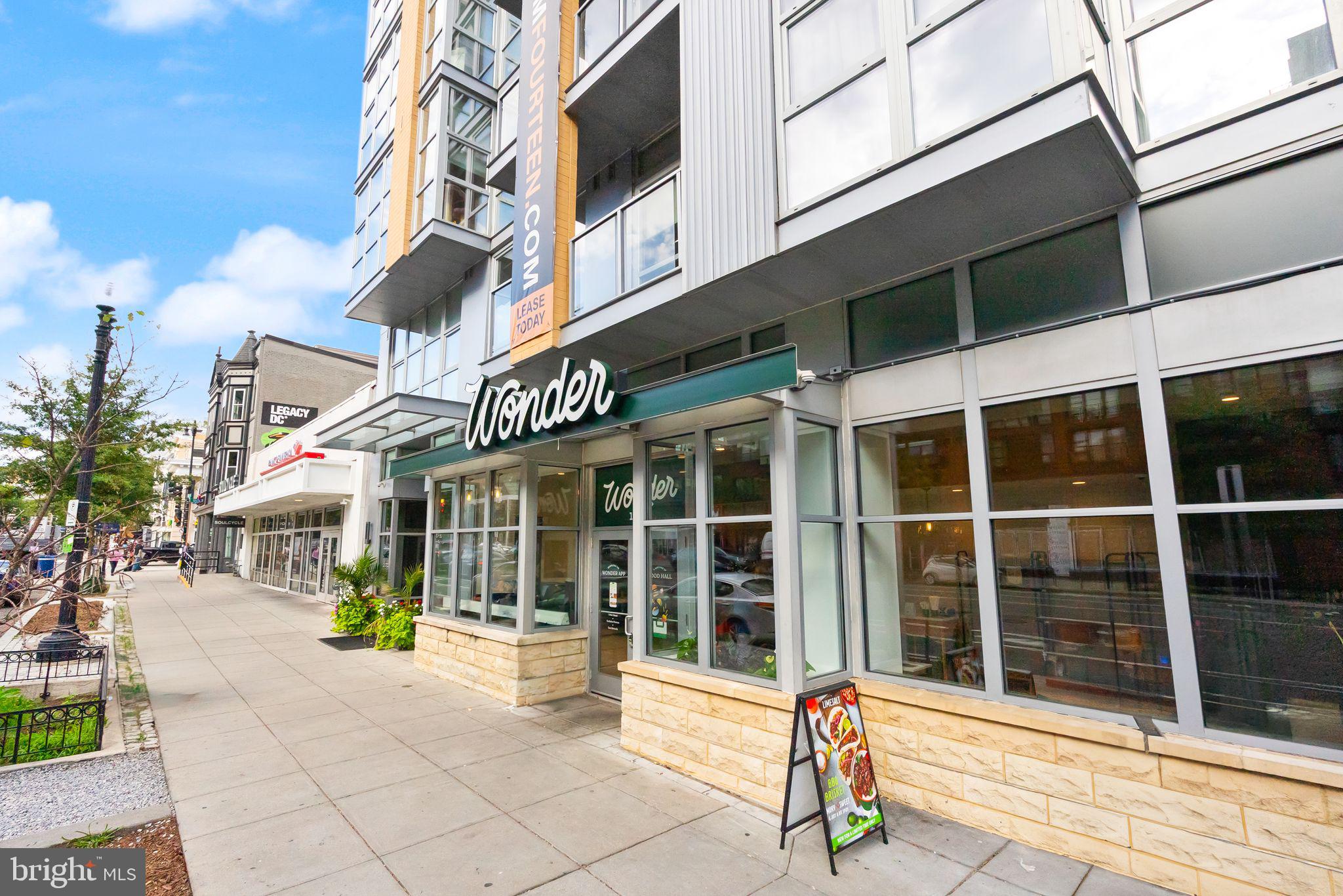 1335 Harvard Street Northwest, Unit 1 Washington, DC 20009 - Photo 28 of 29 Charming urban cafe on a sunny day.