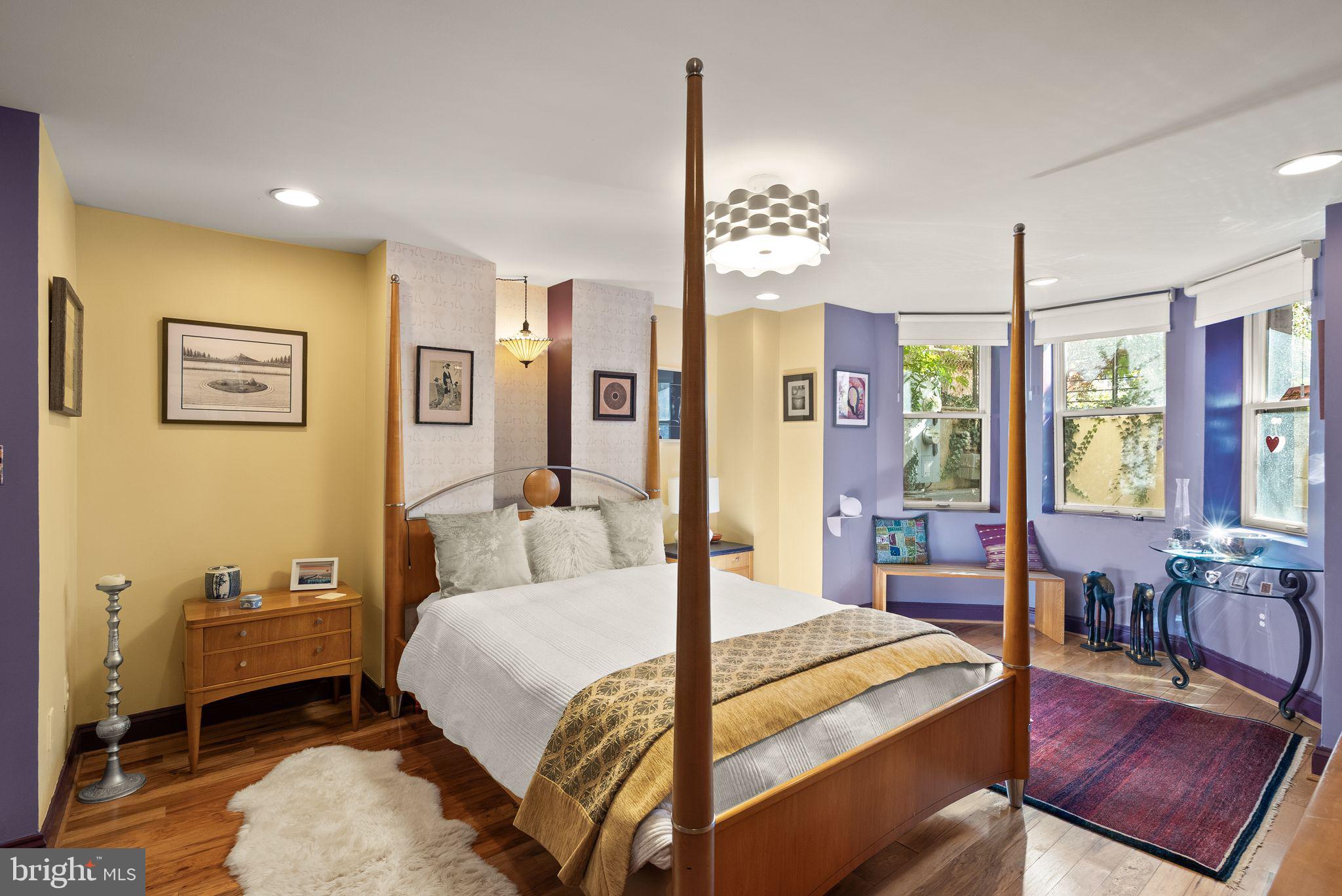 1335 Harvard Street Northwest, Unit 1 Washington, DC 20009 - Photo 9 of 29 Charming bedroom with vibrant hues.