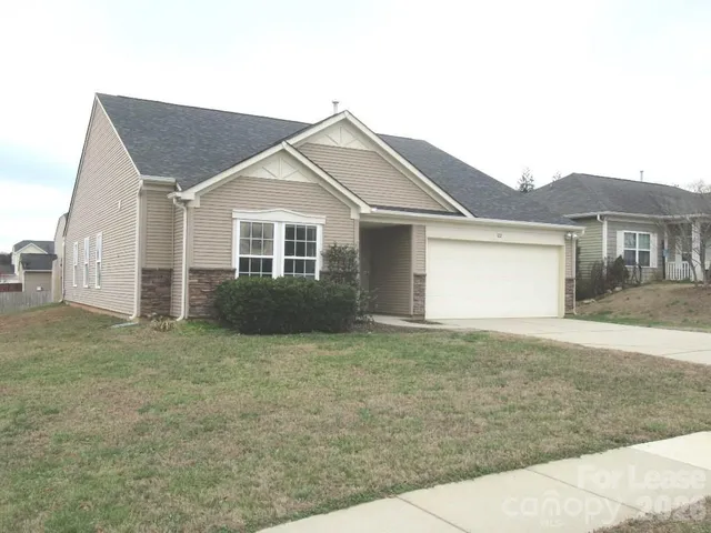 a view of outdoor space yard and garage