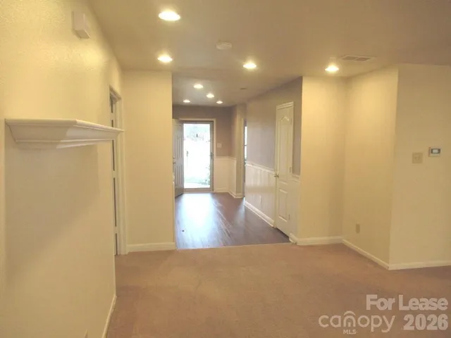 a view of hallway with livingroom