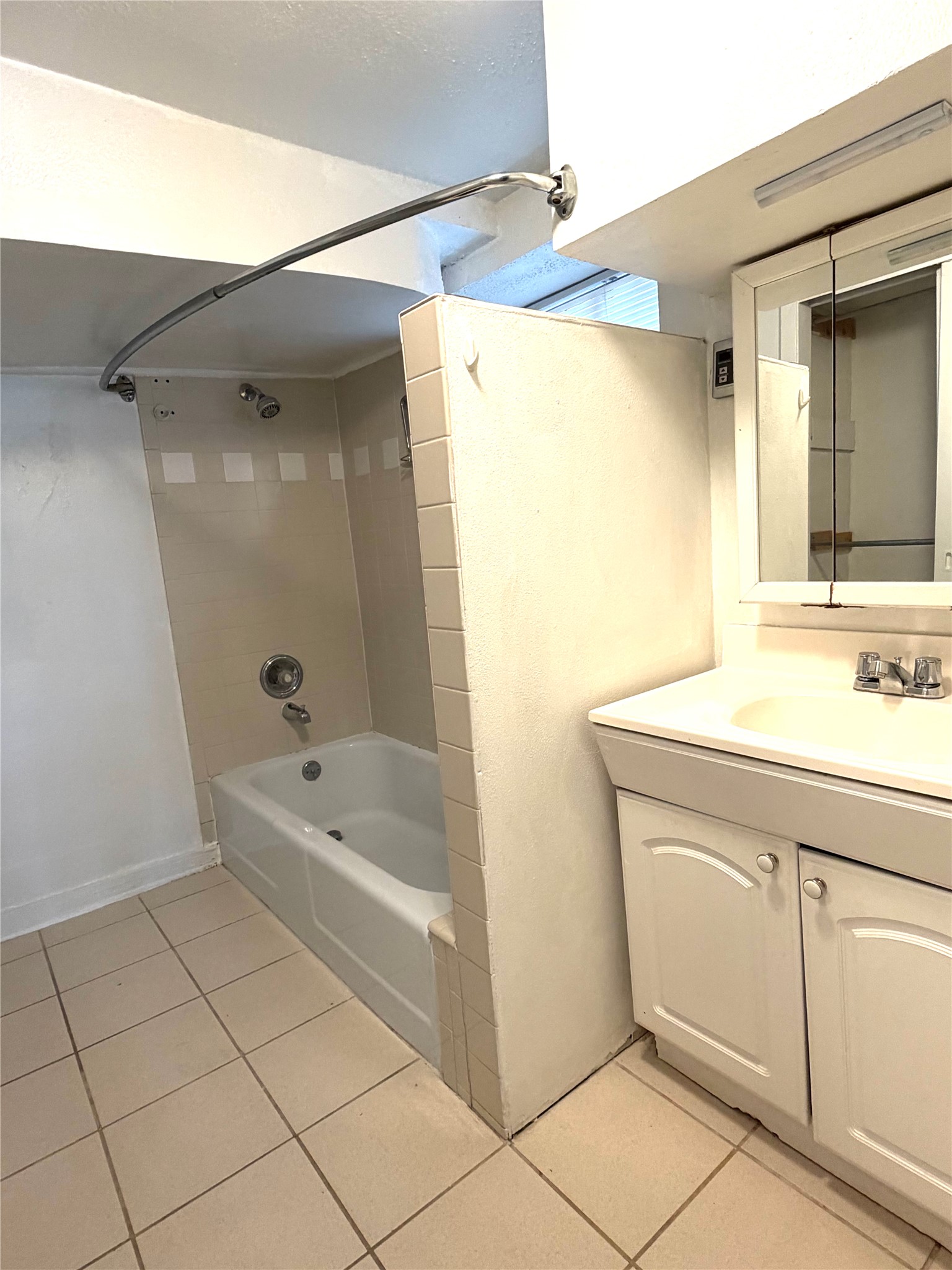 808 Edgecliff Terrace, Unit C Austin, TX 78704 - Photo 7 of 12 Full bathroom with vanity, bathtub / shower combination, and light tile patterned flooring