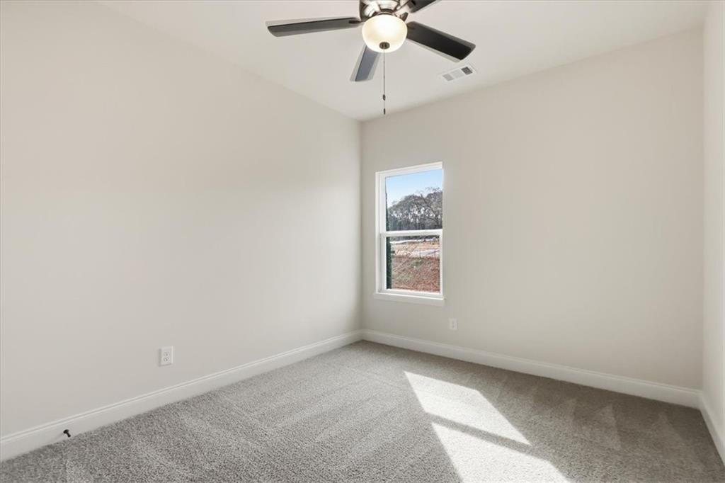 51 Wright Street, Unit 66 Lavonia, GA 30553 - Photo 26 of 47 an empty room with a window