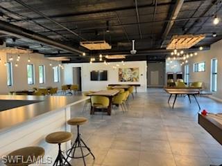 1125 Central Avenue, Unit 461 Naples, FL 34102 - Photo 11 of 19 a lobby with furniture and a rug