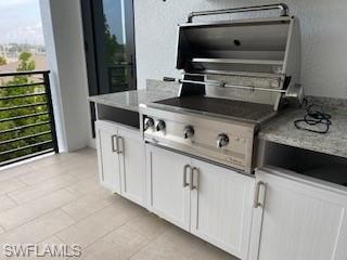 1125 Central Avenue, Unit 461 Naples, FL 34102 - Photo 13 of 19 a close view of washer and dryer