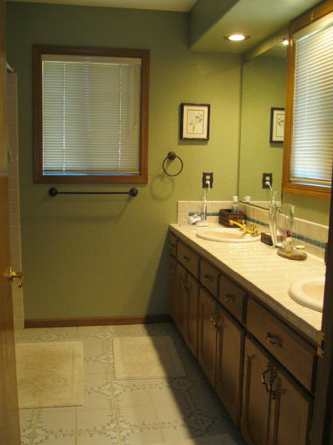 10786 Deschutes Road Palo Cedro, CA 96073 - Photo 14 of 24 a bathroom with a granite countertop sink a mirror and a