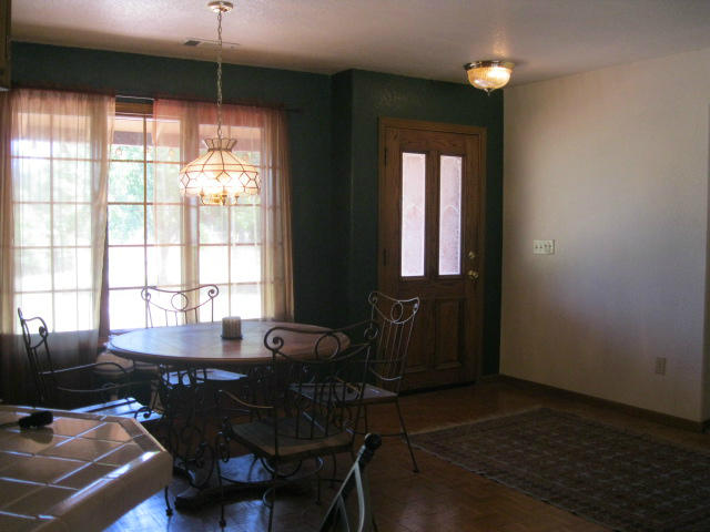 10786 Deschutes Road Palo Cedro, CA 96073 - Photo 4 of 24 a view of a dining room with furniture and window