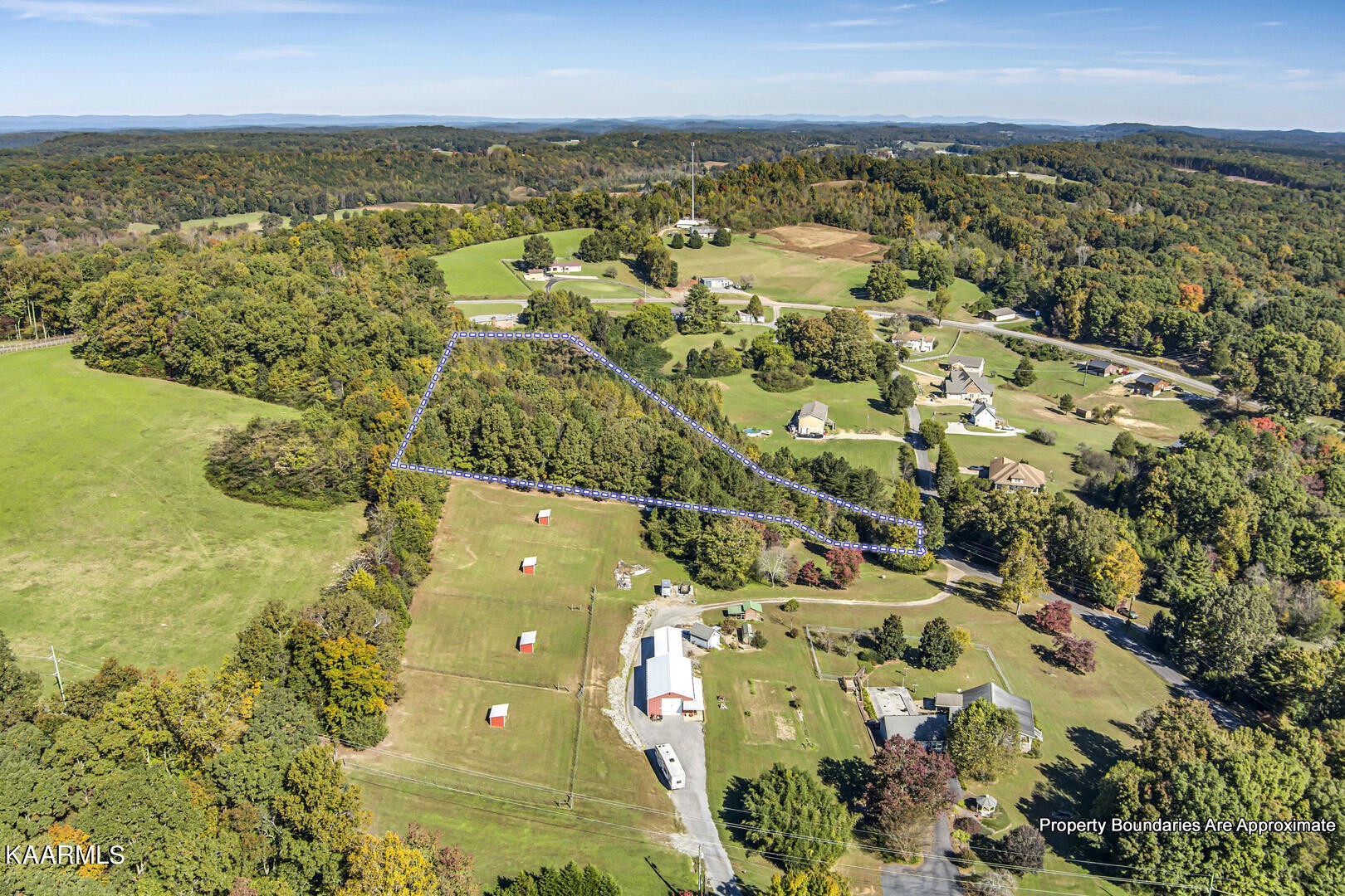 0 County Road 124 Athens, TN 37303 - Photo 11 of 13 an aerial view of residential houses with outdoor space