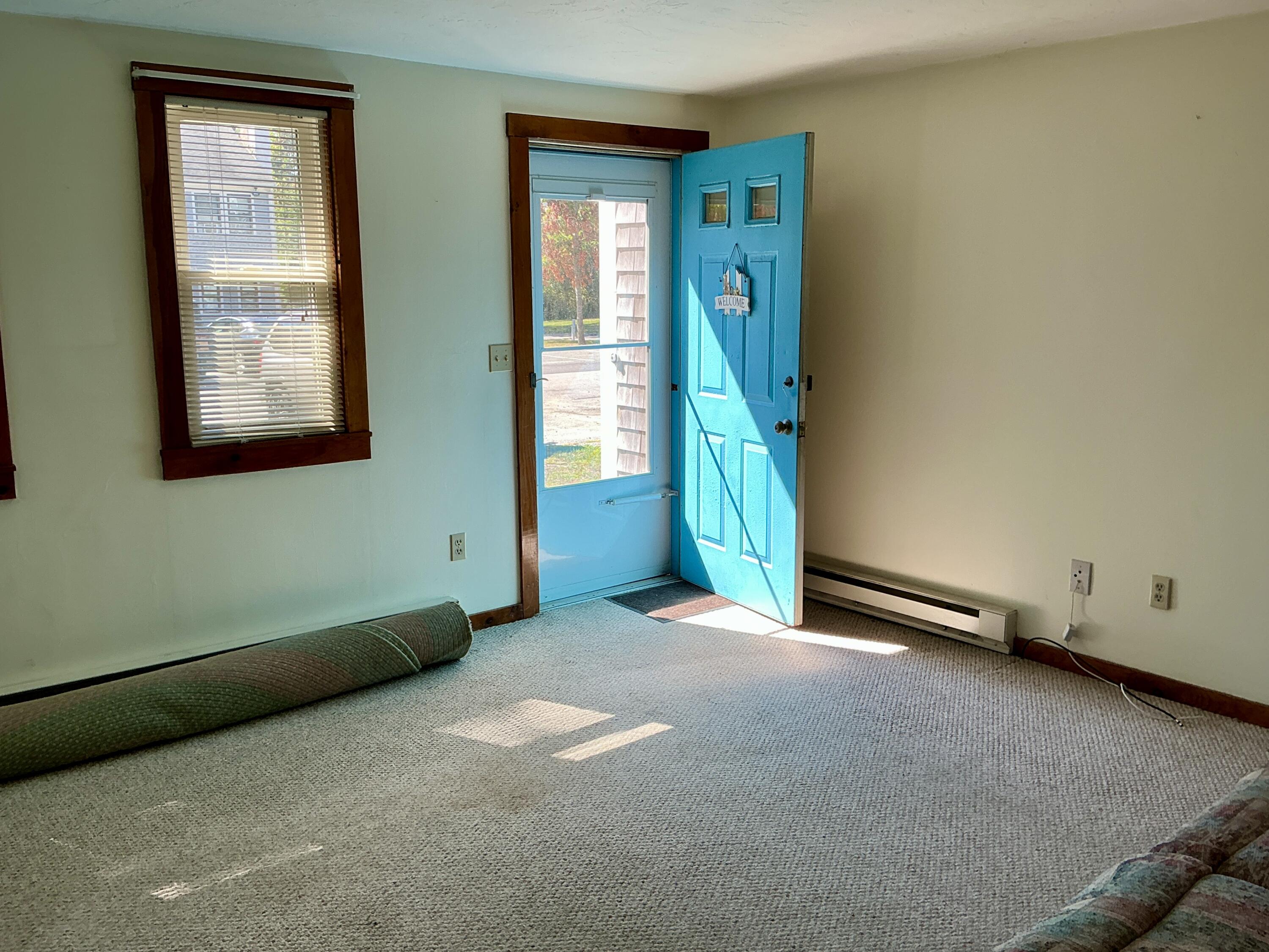300 Falmouth Road, Unit 7E Mashpee, MA 02649 - Photo 17 of 27 an empty room with windows