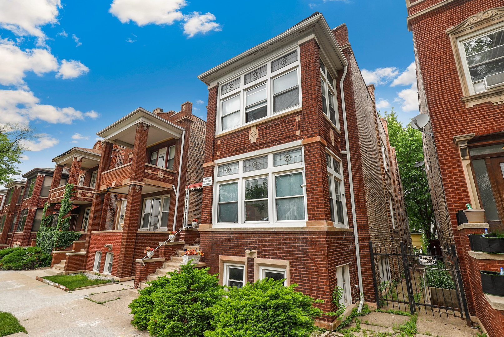 4314 West Cermak Road Chicago, IL 60623 - Photo 4 of 15 a front view of a multi story residential apartment building