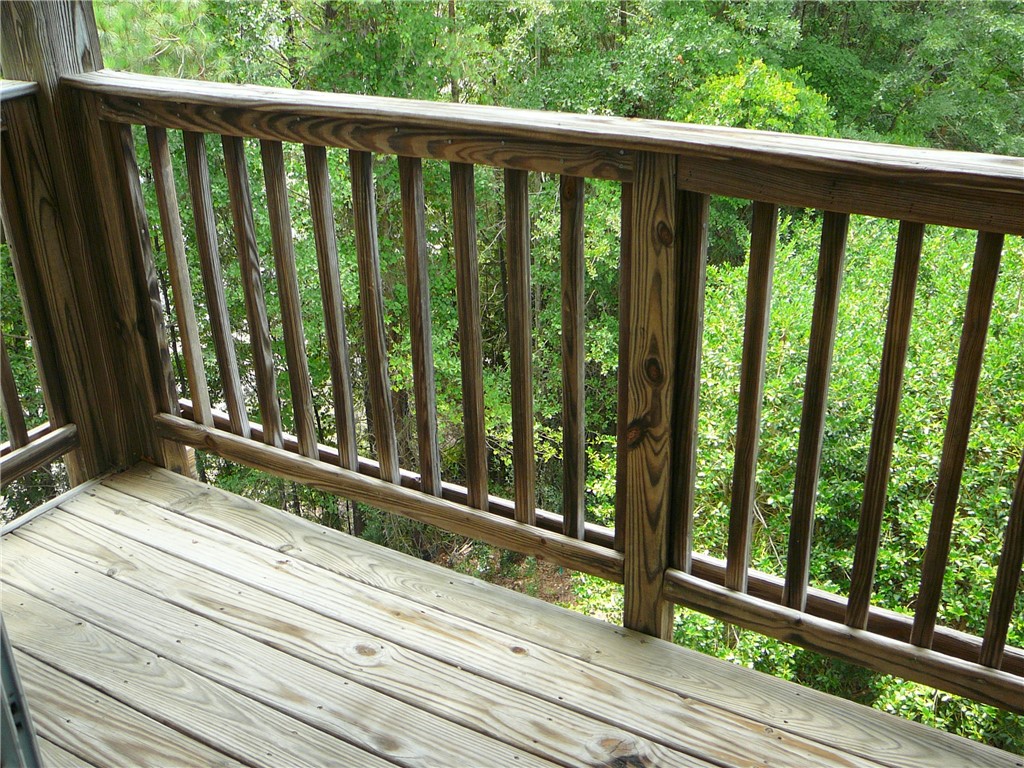 131 Lookover Drive Anderson, SC 29621 - Photo 5 of 18 A tranquil balcony provides a private overlook into a verdant, natural setting.