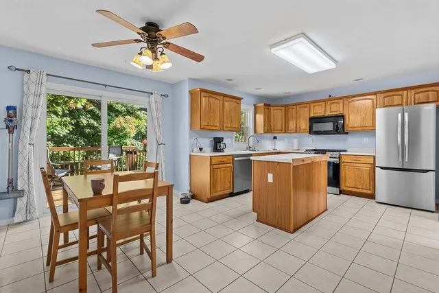 a workspace with furniture and window