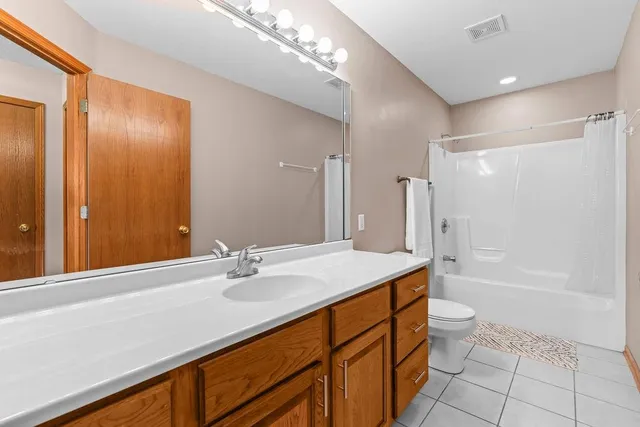 a view of a room with large windows