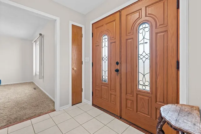 a view of a livingroom with furniture and a fireplace