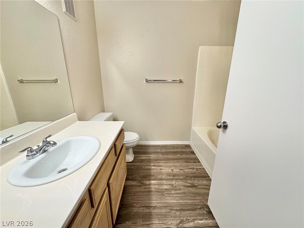 8070 West Russell Road, Unit 2121 Las Vegas, NV 89113 - Photo 11 of 22 Functional full bathroom featuring a tub and a vanity with ample counter space.