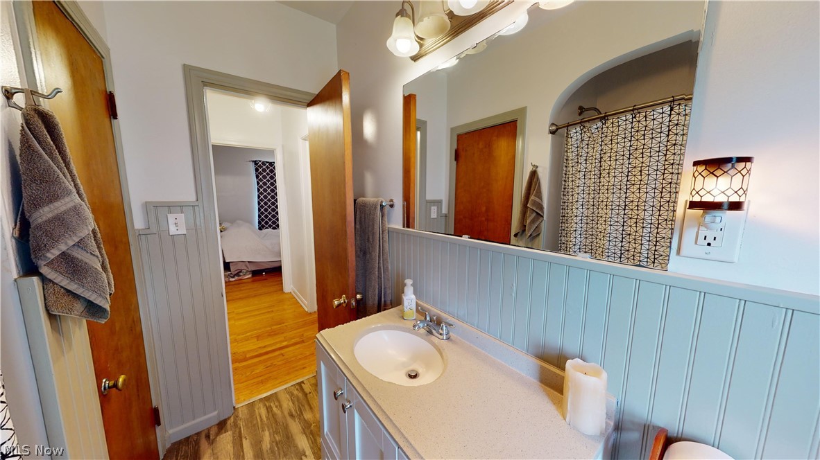 343 Canton Road Akron, OH 44312 - Photo 21 of 37 Bathroom with wood-type flooring and large vanity
